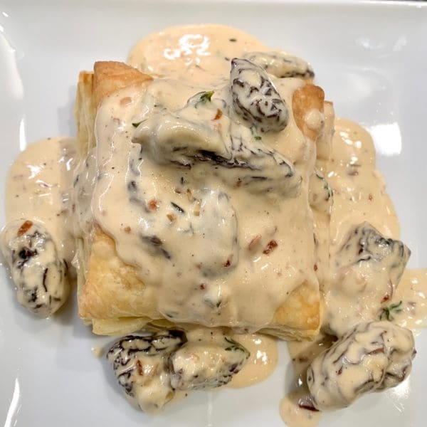 morel mushroom in cream sauce on puff pastry