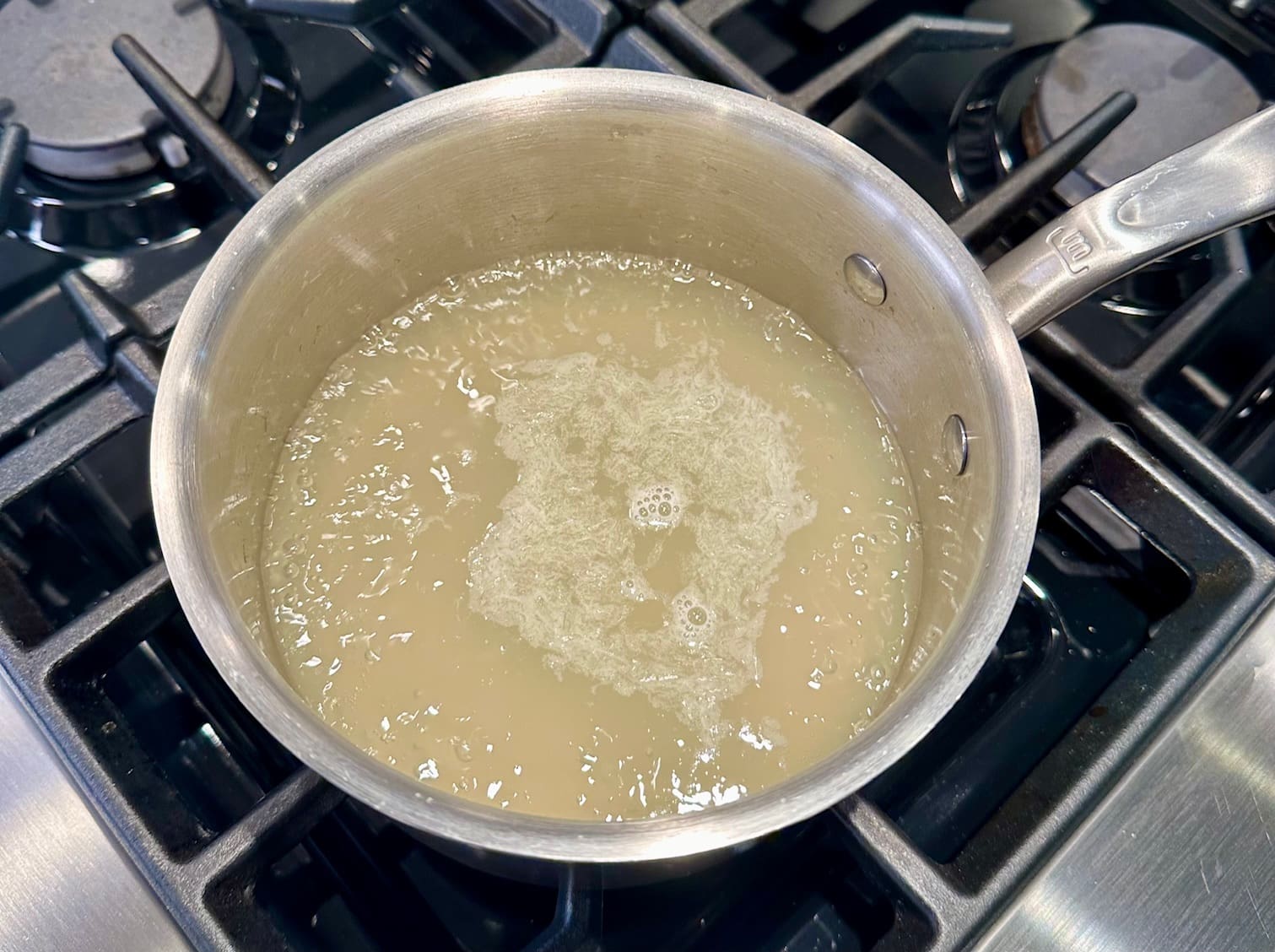 simmering water sugar and lime juice